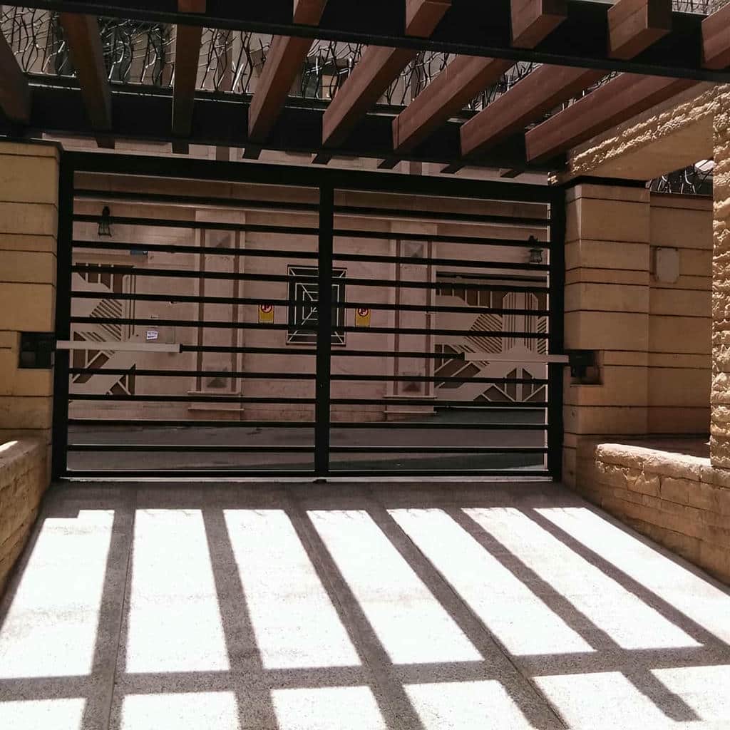 کارخانه جک درب پارکینگ درب لولایی در پردیس