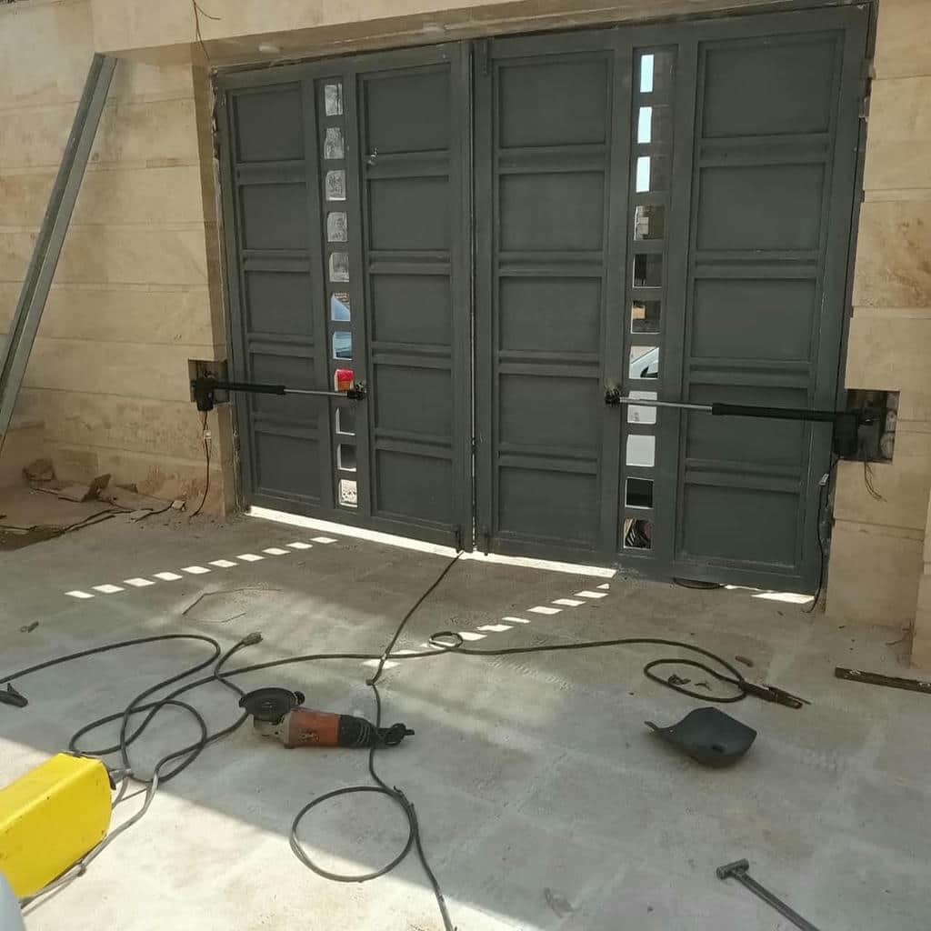 نصب جک درب پارکینگ تنظیمات تخصصی در کمال شهر