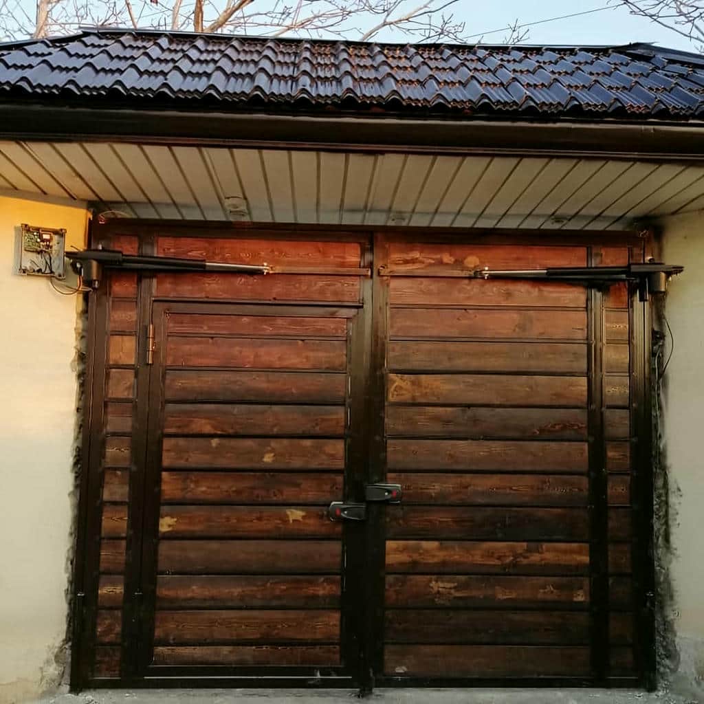 نصب جک درب پارکینگ تنظیم دقیق در کاشان
