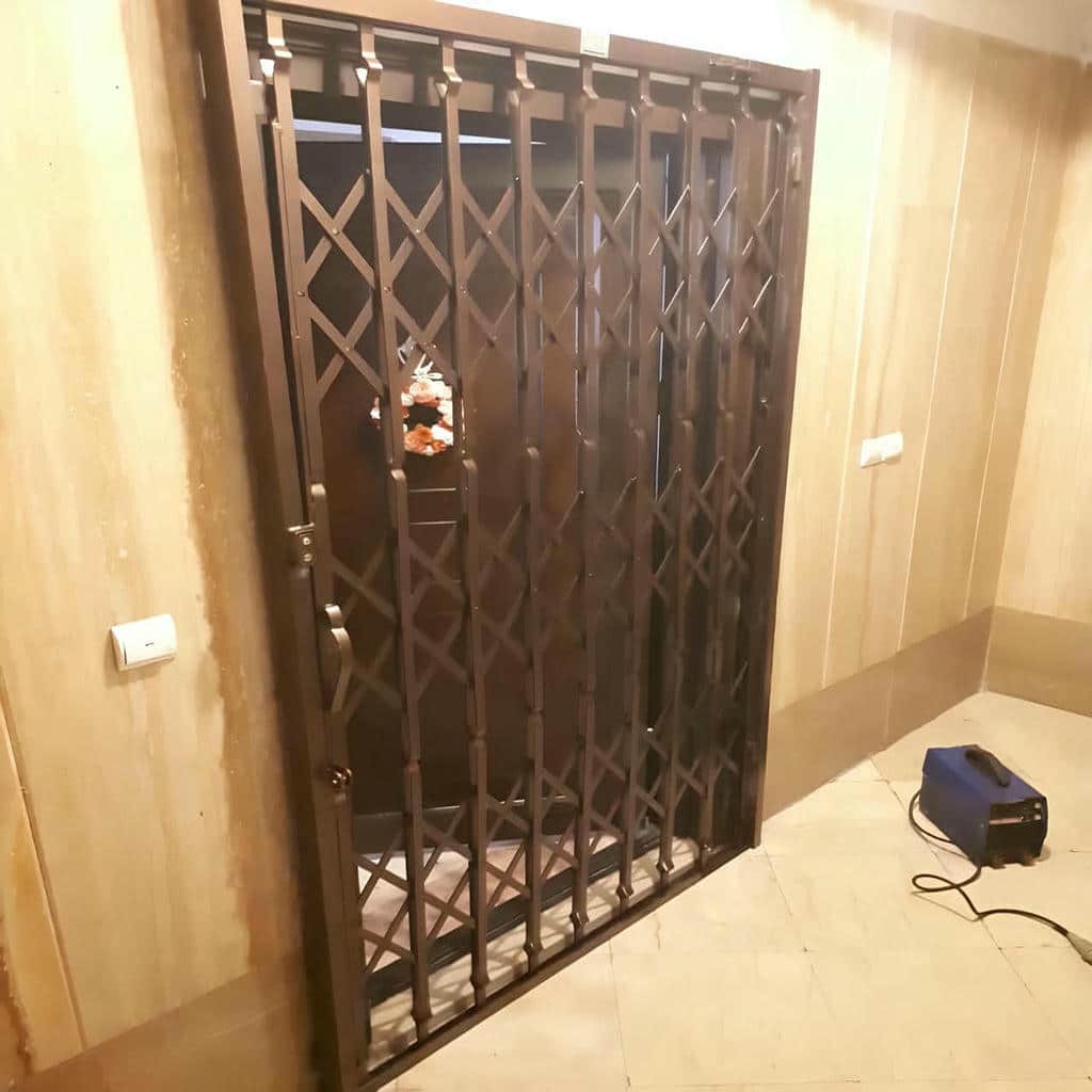 خرید درب آکاردئونی فلزی ضدبرش در بومهن
