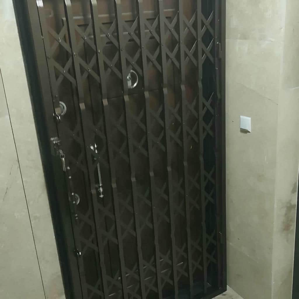 قیمت درب آکاردئونی فلزی تسمه تقویت شده در بومهن