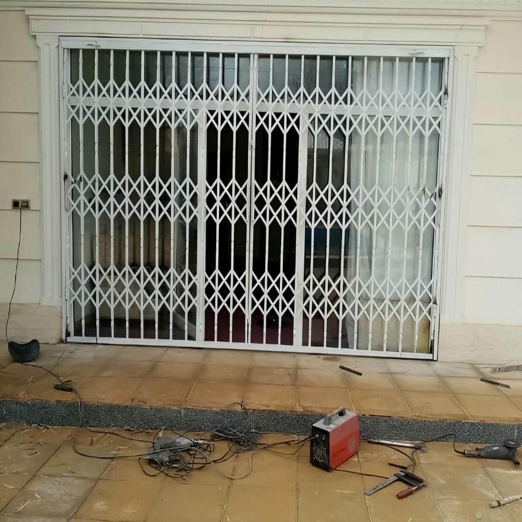 خرید درب آکاردئونی فلزی دوگل در ساوه