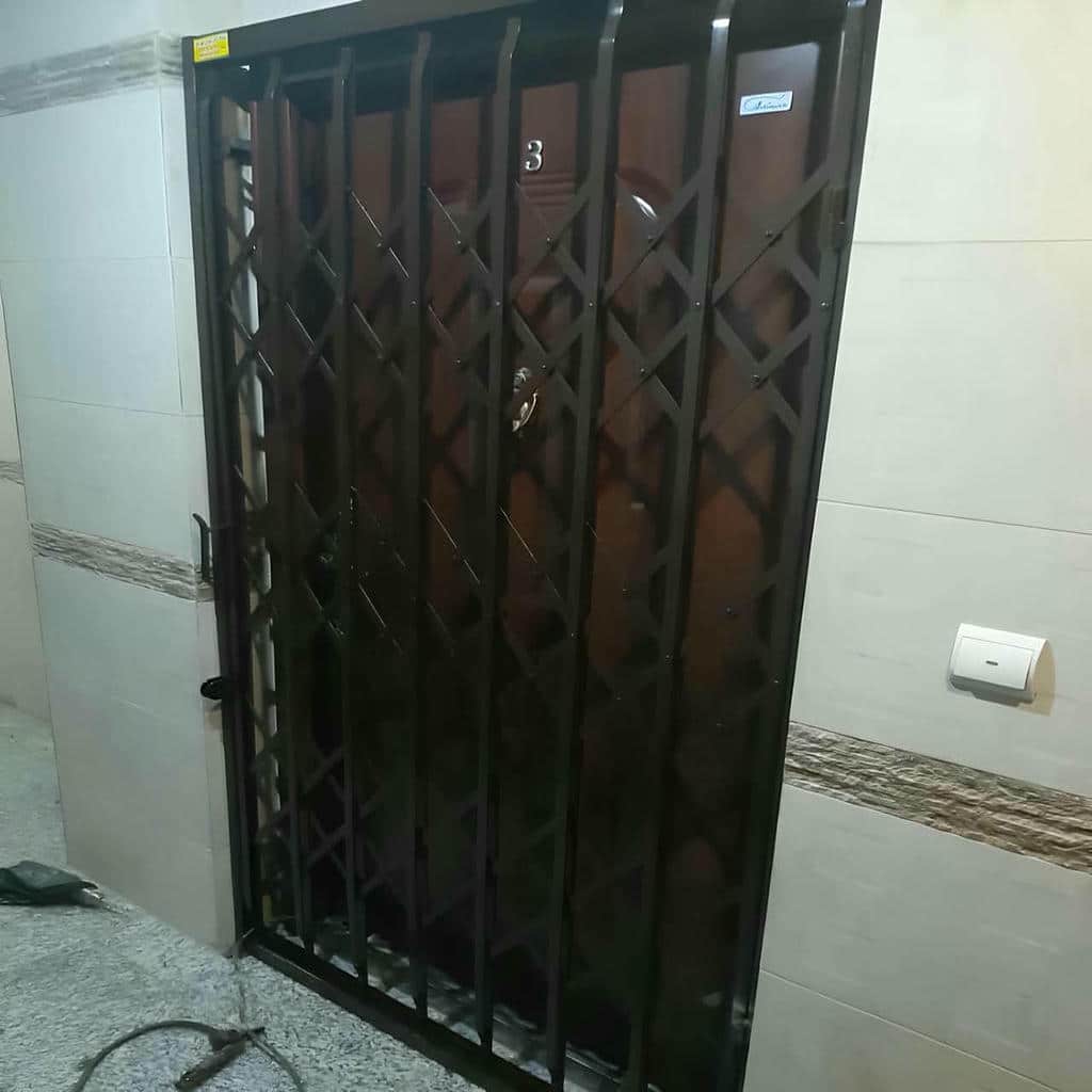 قیمت درب آکاردئونی فلزی تسمه تقویتشده در مشهد