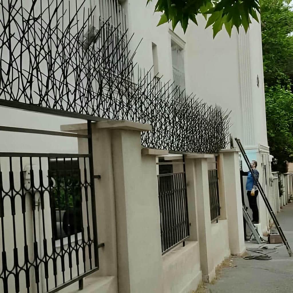 نصب حفاظ شاخ گوزنی دیوار ساختمان رنگ کوره ای در قم
